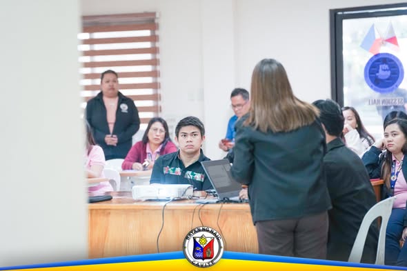 Mga kalahok sa Naic Municipal Project Monitoring Committee na nagpupulong sa ABC Hall