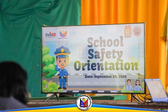 Poster: School Safety Orientation, Setyembre 29, 2026, Naic Elementary School, ipinakita sa malaking screen