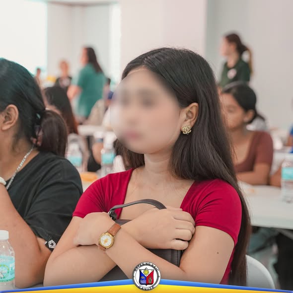 Mga dumalo sa Girl Child Week Celebration 2025 na nakaupo sa loob ng hall habang nakikinig sa programa