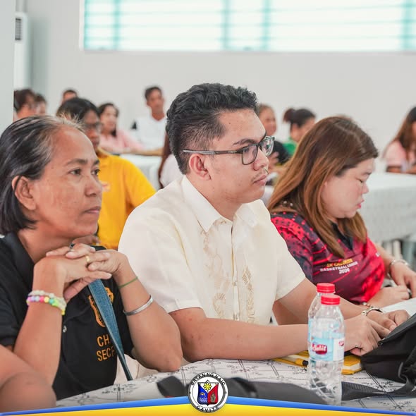 Mga dumalo sa Local Development Council meeting na nakaupo at nakikinig sa loob ng silid-pulungan sa Naic