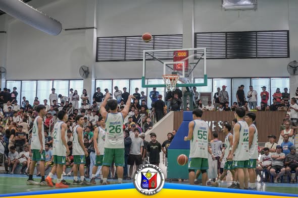 Mga manlalaro ng Team Naic Posible habang nagsho-shoot sa finals game ng Cavite Ballers League sa Naic