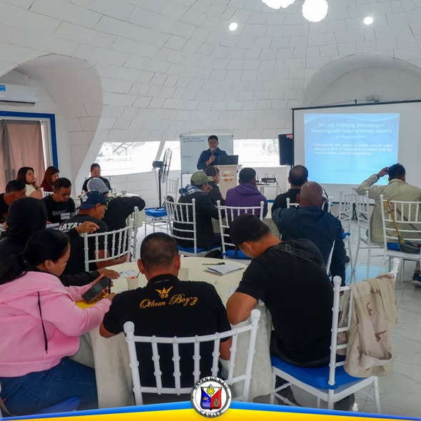 Mga kalahok ng paralegal training para sa Bantay Dagat habang nakikinig sa presentasyon sa loob ng hall