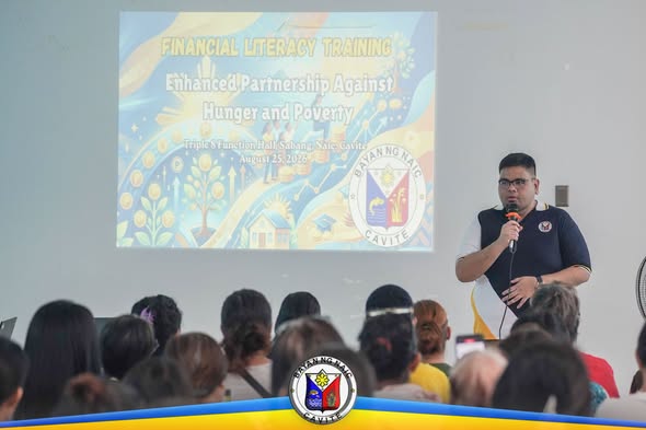 Financial Literacy Training sa Triple 8, Sabang, Naic, Agosto 25, 2026; tagapagsalita habang nagsasalita sa harap ng mga…