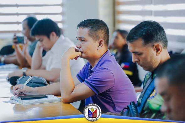 Mga kalahok na nakikinig sa Third Joint MPOC-MADAC-MTF-ELCAC Meeting sa ABC Hall, Naic