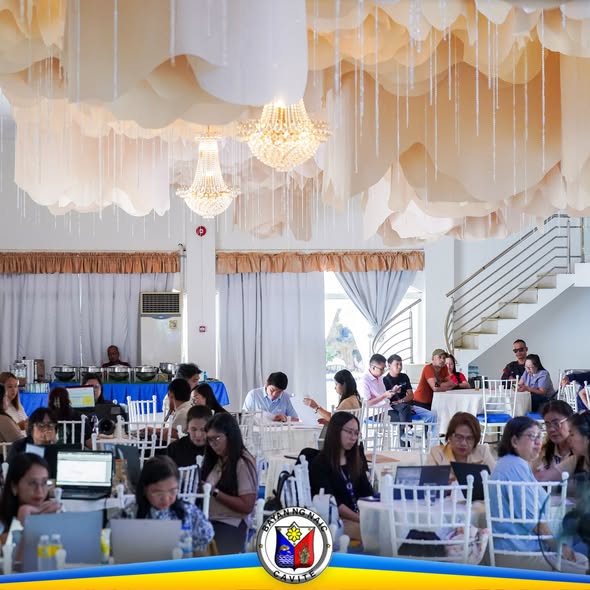 Mga kalahok sa Revenue Code Seminar na nakaupo at may laptop sa function hall ng Torres Farm, Sabang