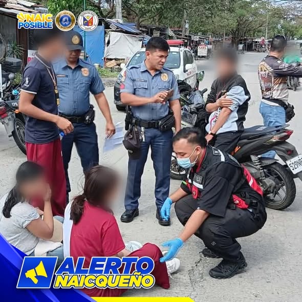 Mga rumespondeng nagbibigay ng paunang lunas sa mga biktima ng aksidente sa kalsada, Brgy. Timalan Balsahan