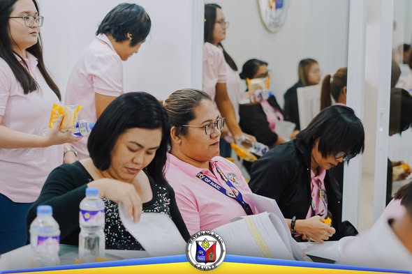 Mga kalahok sa Budget Call 2026 na abala sa pagbabasa ng mga dokumento sa Naic Municipal Hall