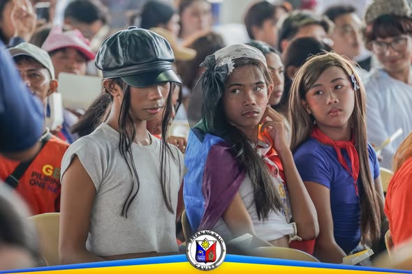 Mga kalahok na nakaupo sa Pride Month Celebration sa Naic Town Plaza, Naic, Cavite