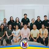 Grupo ng mga kalahok sa Third Quarter Local Health Board Meeting ng Naic sa loob ng silid