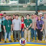 Grupo ng mga kalahok at opisyal na nagpose sa covered court sa Palangue 3 para sa Zero Waste assessment