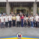 Grupo ng mga kawani at opisyal sa harap ng Naic Municipal Hall matapos ang flag raising ceremony, Disyembre 1, 2025